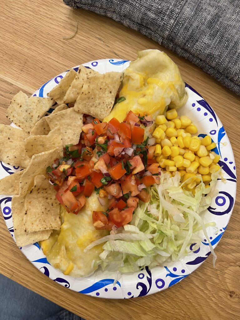 chicken enchilada on plate